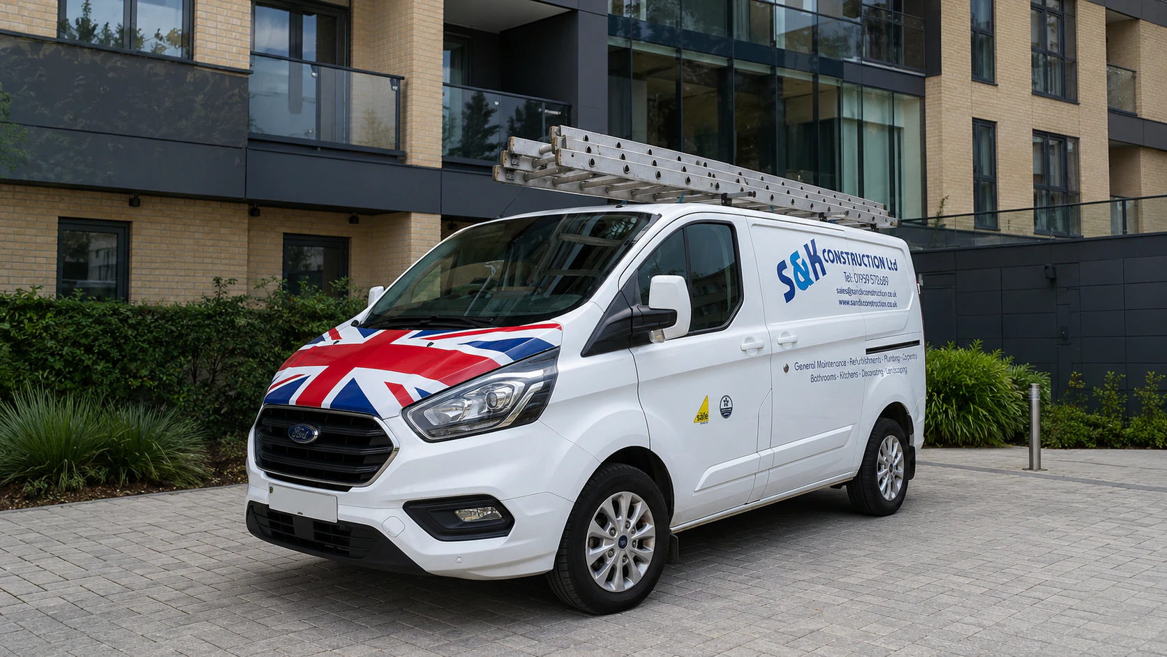 An S&K Construction van outside a managed residential building